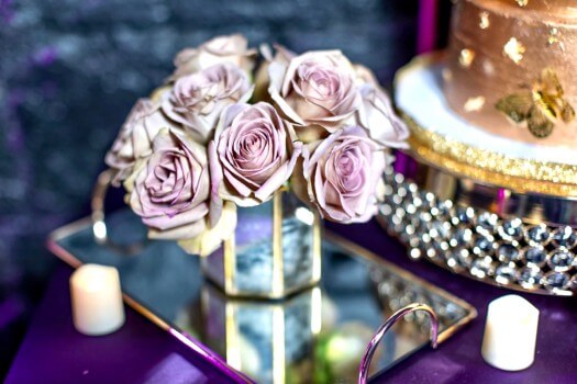 Purple royal flowers and table setting by Dacres Decor Design